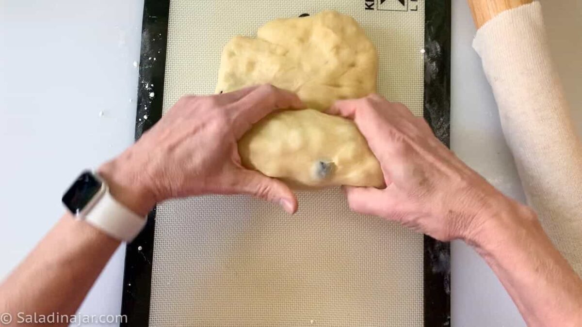 Rolling up the dough.