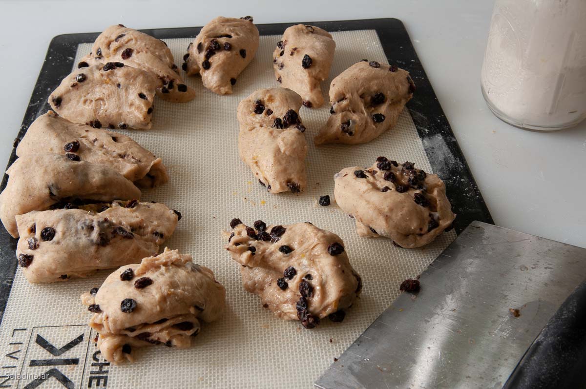 Dough is portioned into 12 eqally-sized pieces.