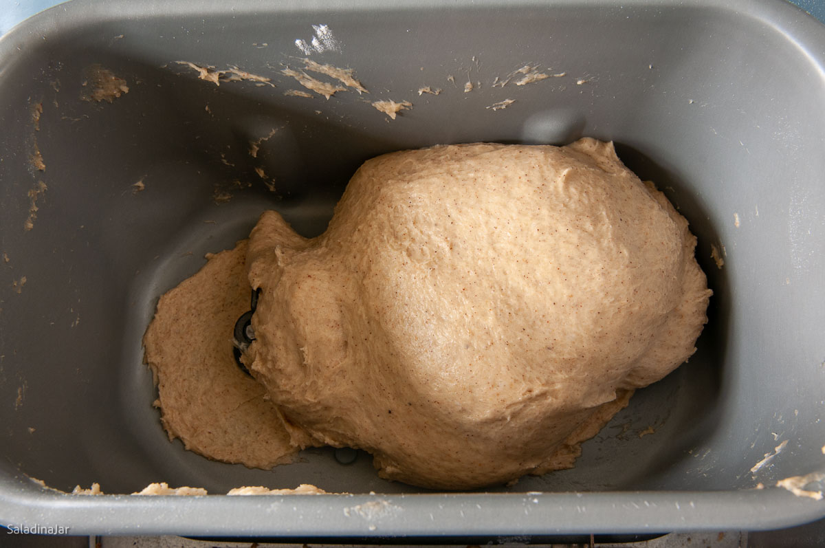 Dough that sticks to the side and pulls away from the edge. Your dough should look like this.