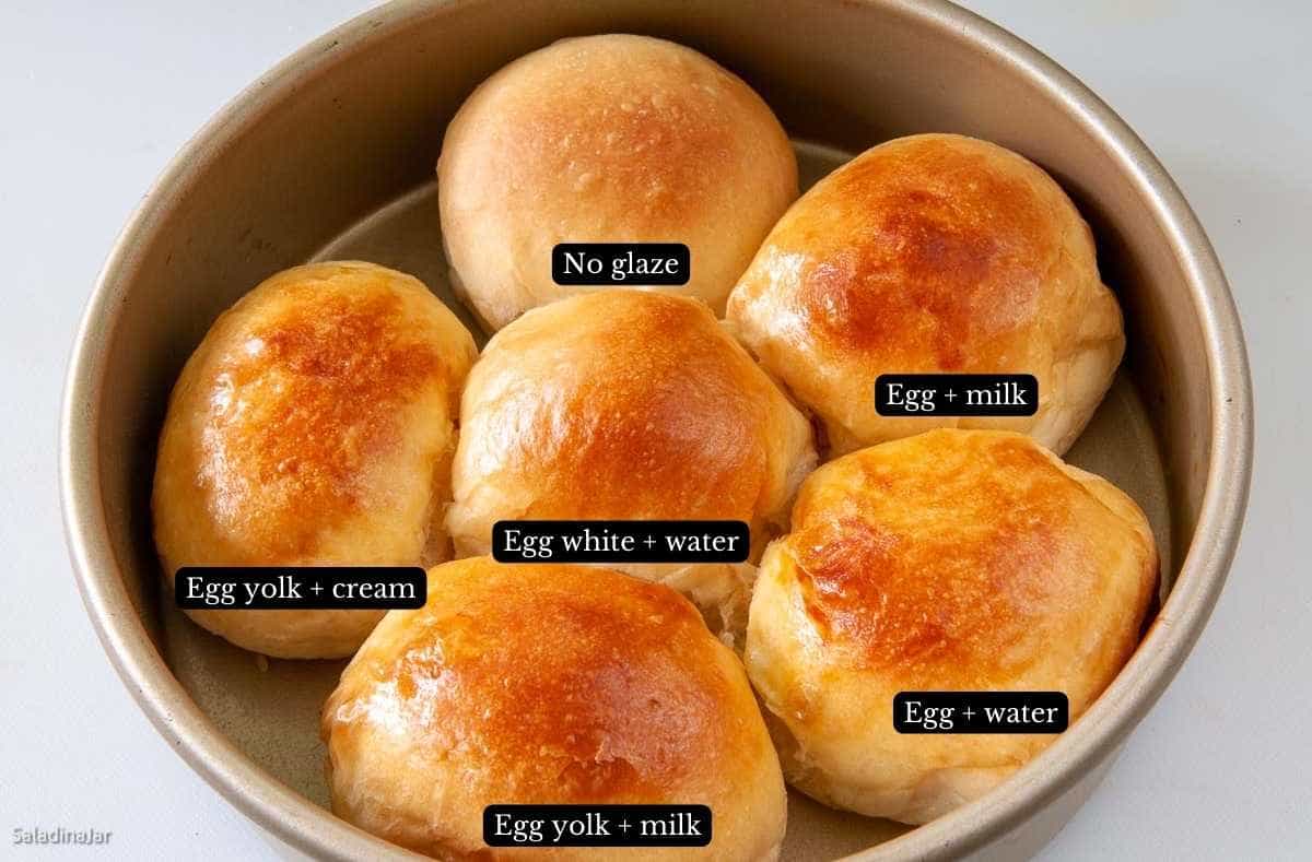 comparison of egg-glazed rolls in a circular pan--labeled.