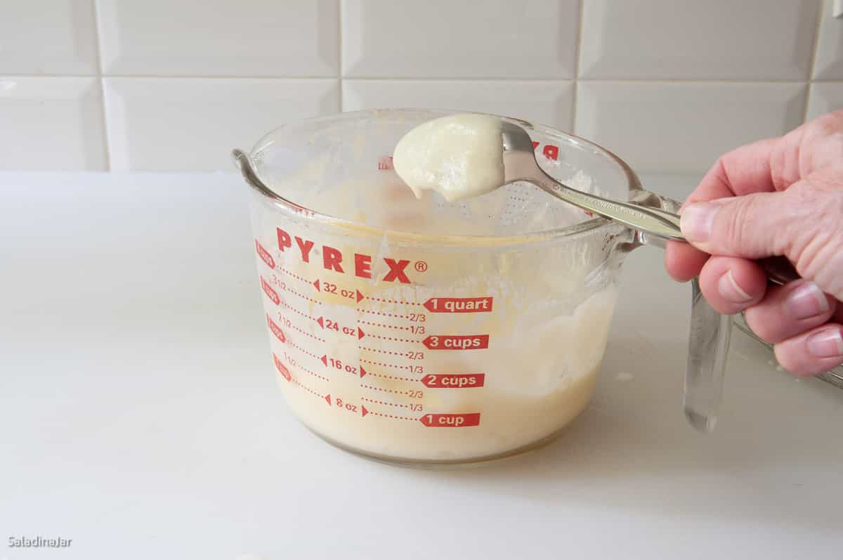 mixture coating the back of the spoon.