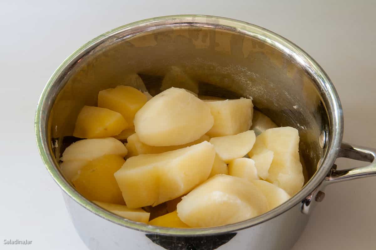 cooking potatoes in a large pot
