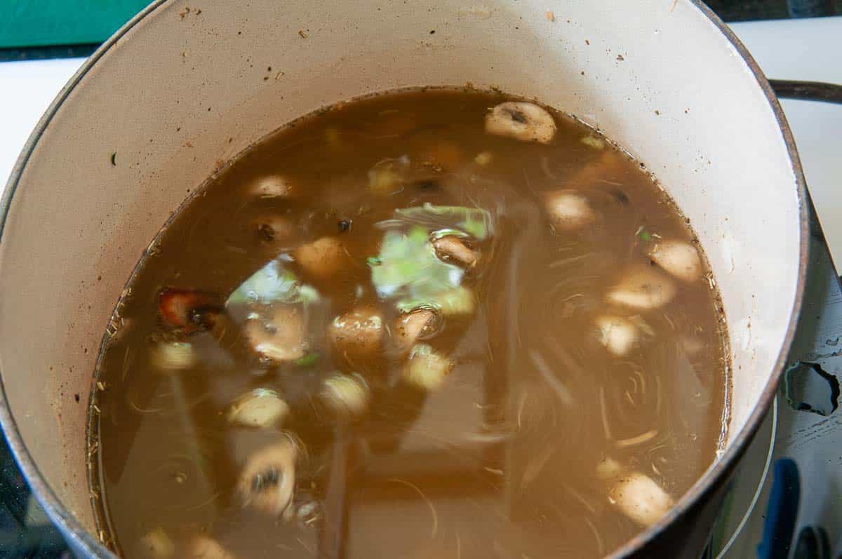 adding the chicken broth.