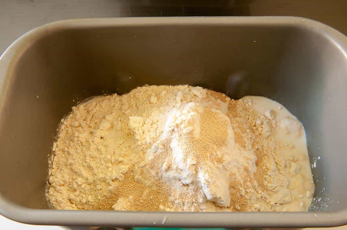 dough ingredients inside the bread machine pan