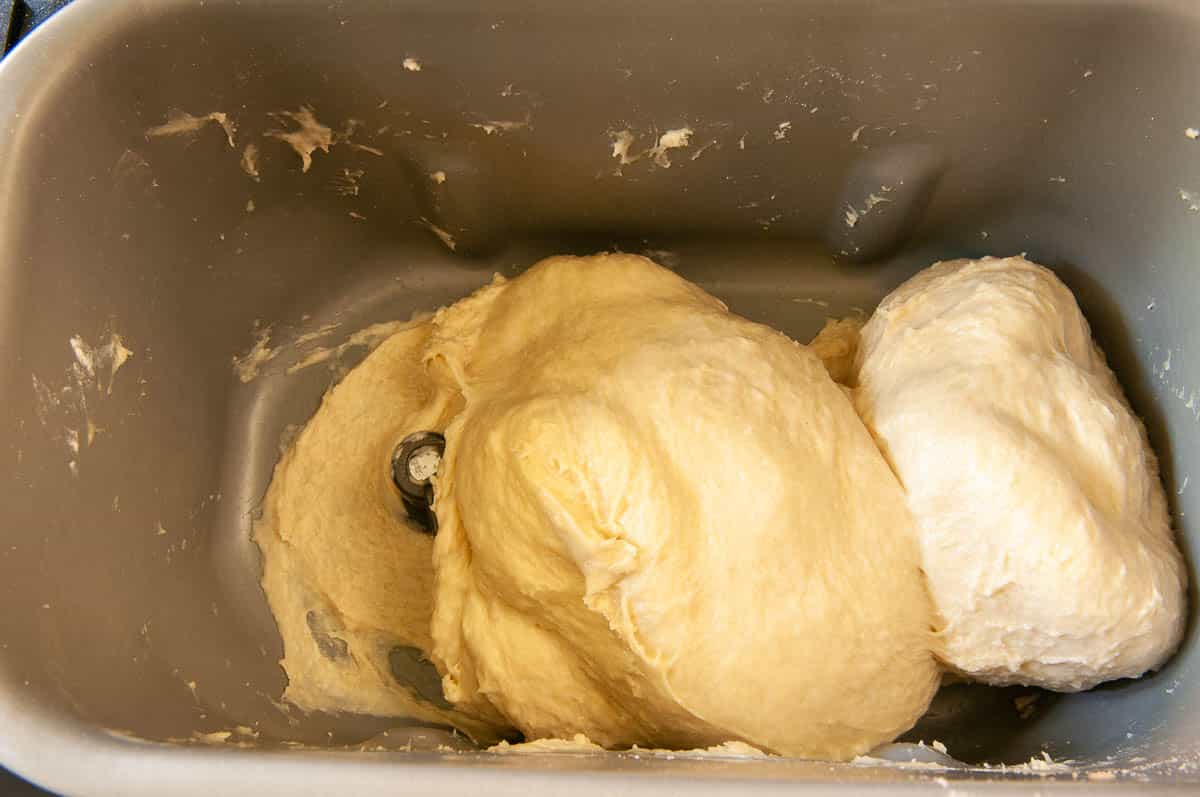 dough should be smooth and elastic when the kneading phase is almost done.