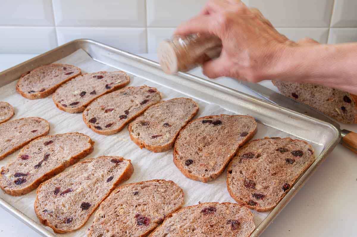 Sprinkle bread slices with sugar and cinnamon 