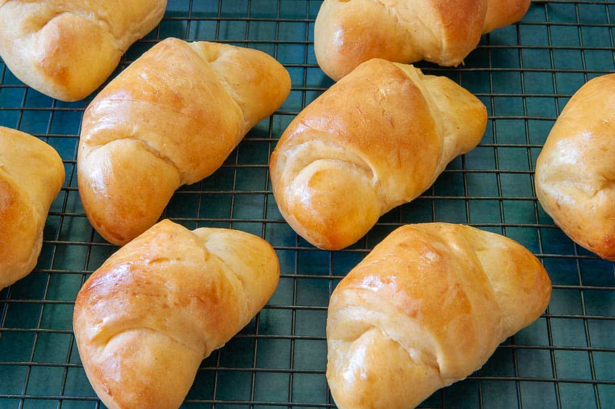 baked crescents on a wire rack