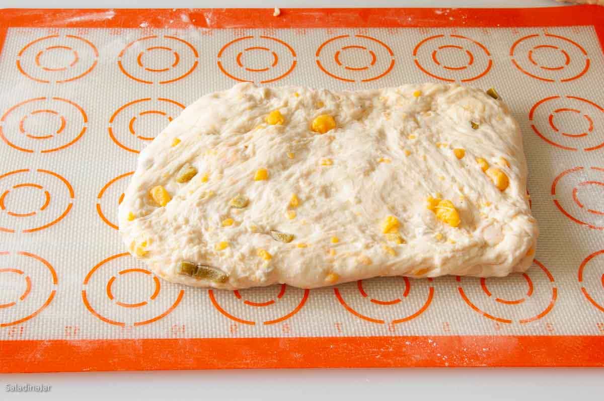 Shaping the dough into a rectangle.
