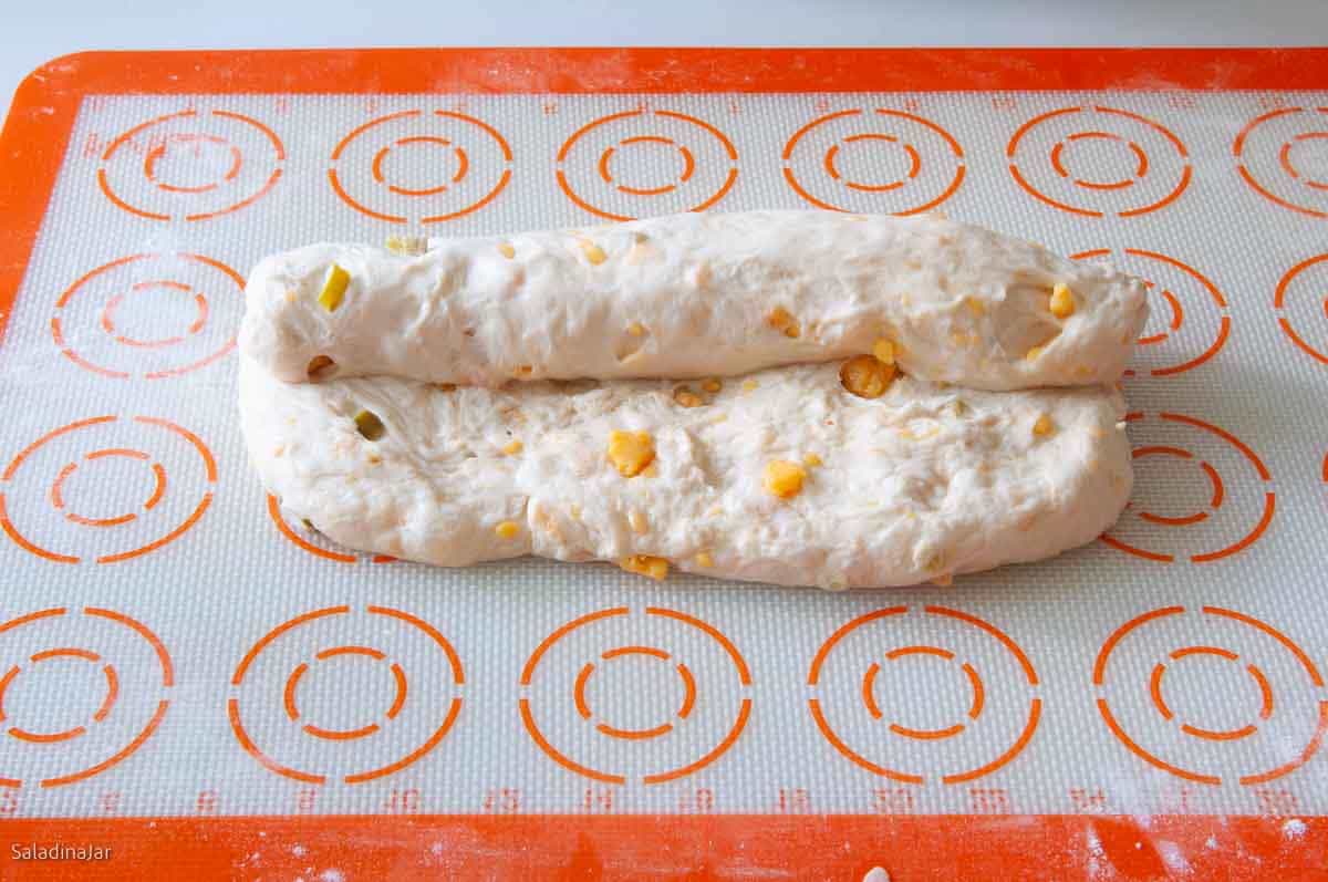 Use your hands to roll up the dough without stretching or leaving room for large air bubbles.