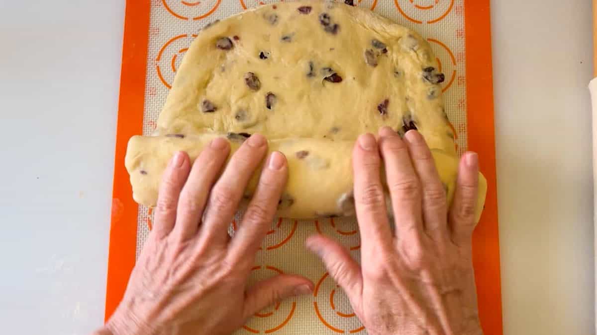 rolling dough into a cylinder