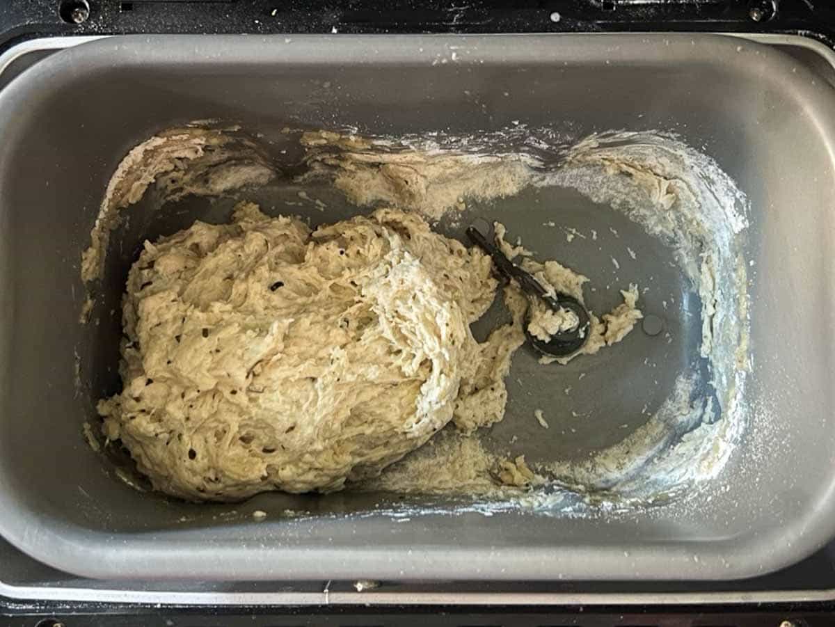 Dough starting to clump immediately after the machine starts to mix the dough.