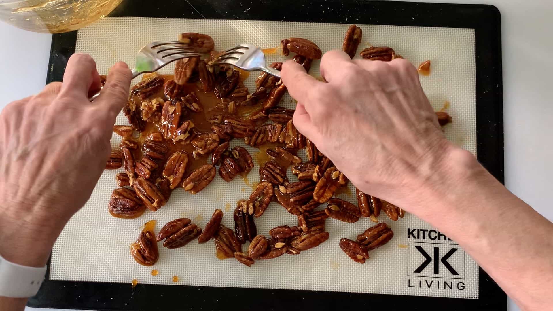 use two forks to pull hot pecans apart.