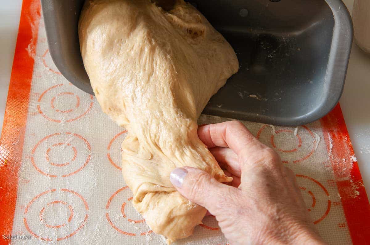 Pull the dough out onto a lightly floured surface.