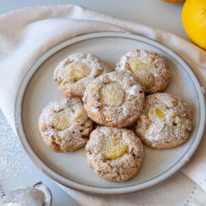 finished lemon curd cookies on a serving plate