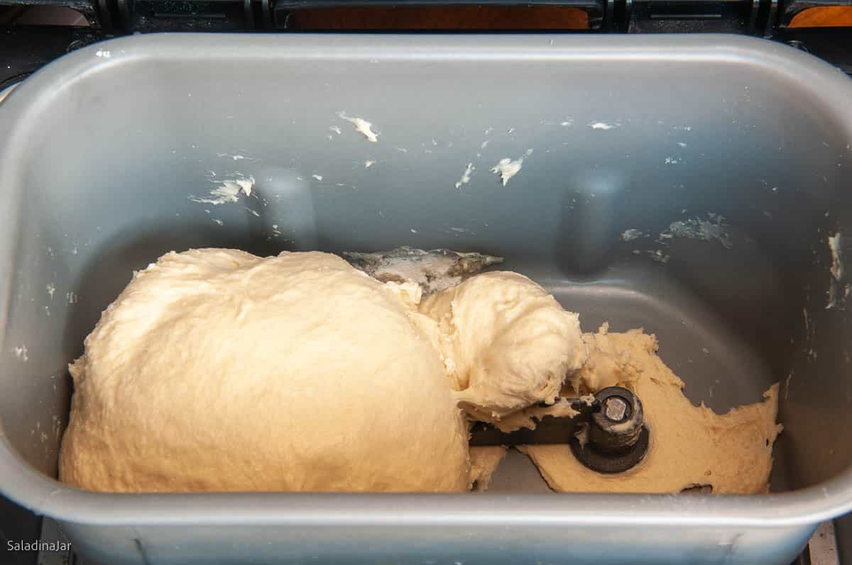 When you recheck the dough after 15 minutes of kneading, the dough should be elastic and smooth as shown.