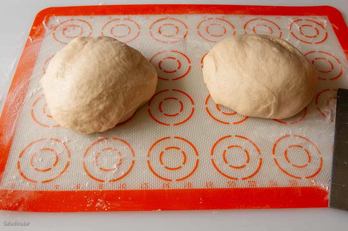 Dough is divided in half and each formed into a small ball.