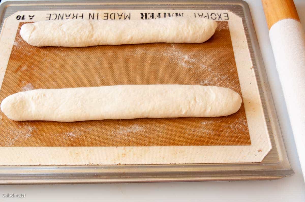 Flipping the dough over and preparing for the final rise.