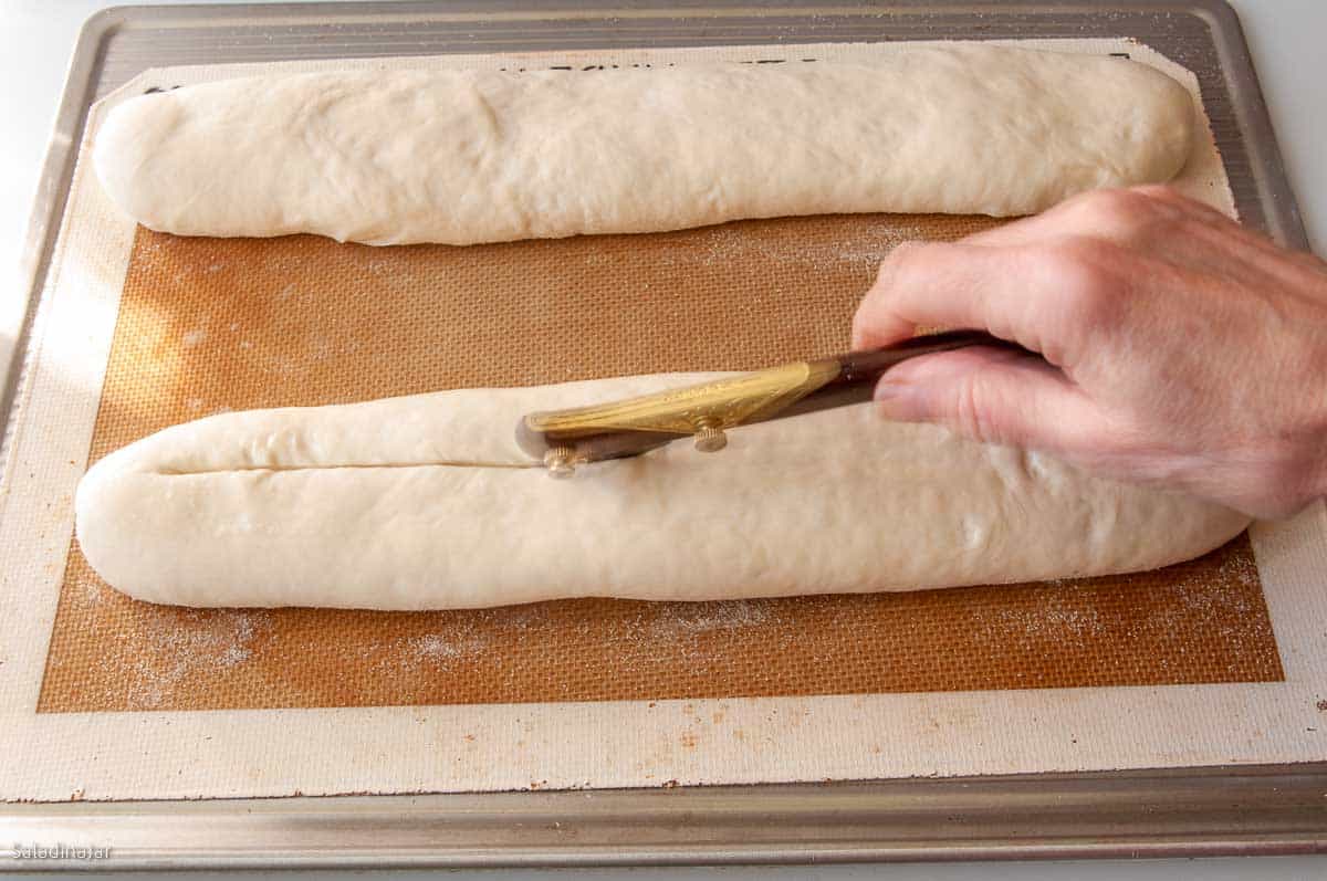 Slashing the dough.
