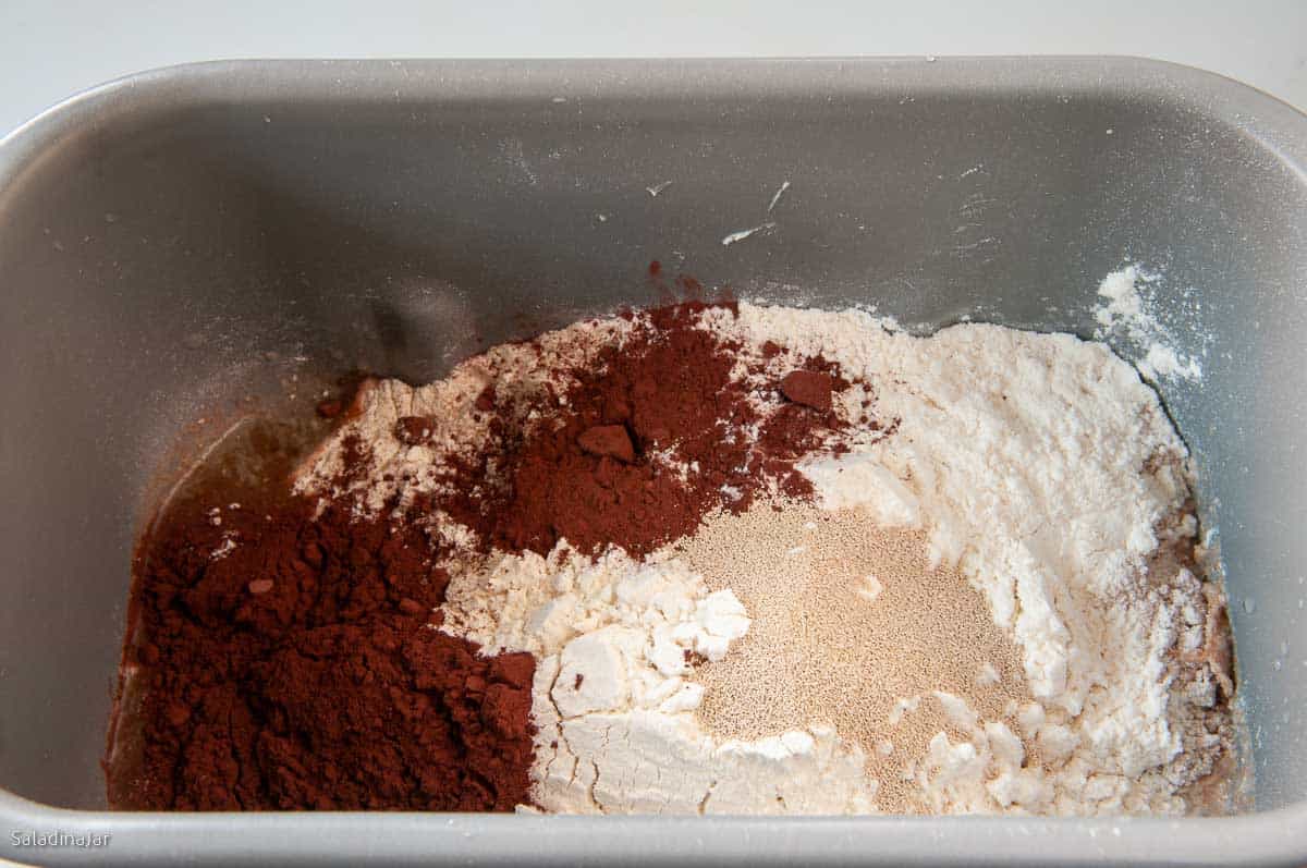 all ingredients added to the bread machine pan before starting the machine.