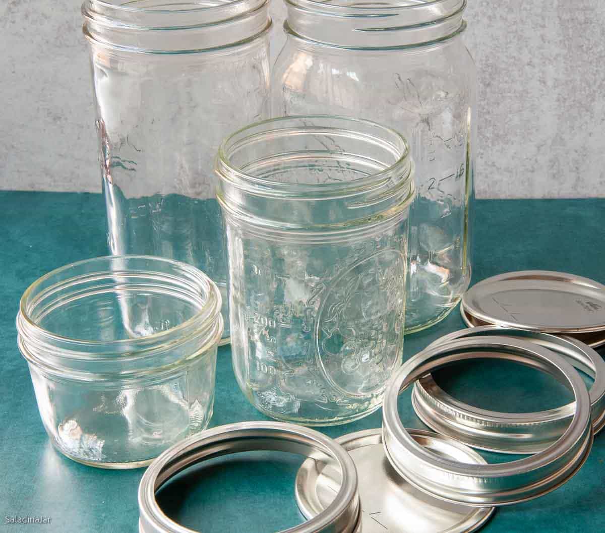 empty Mason jars of different sizes and the metal 2-part lids.