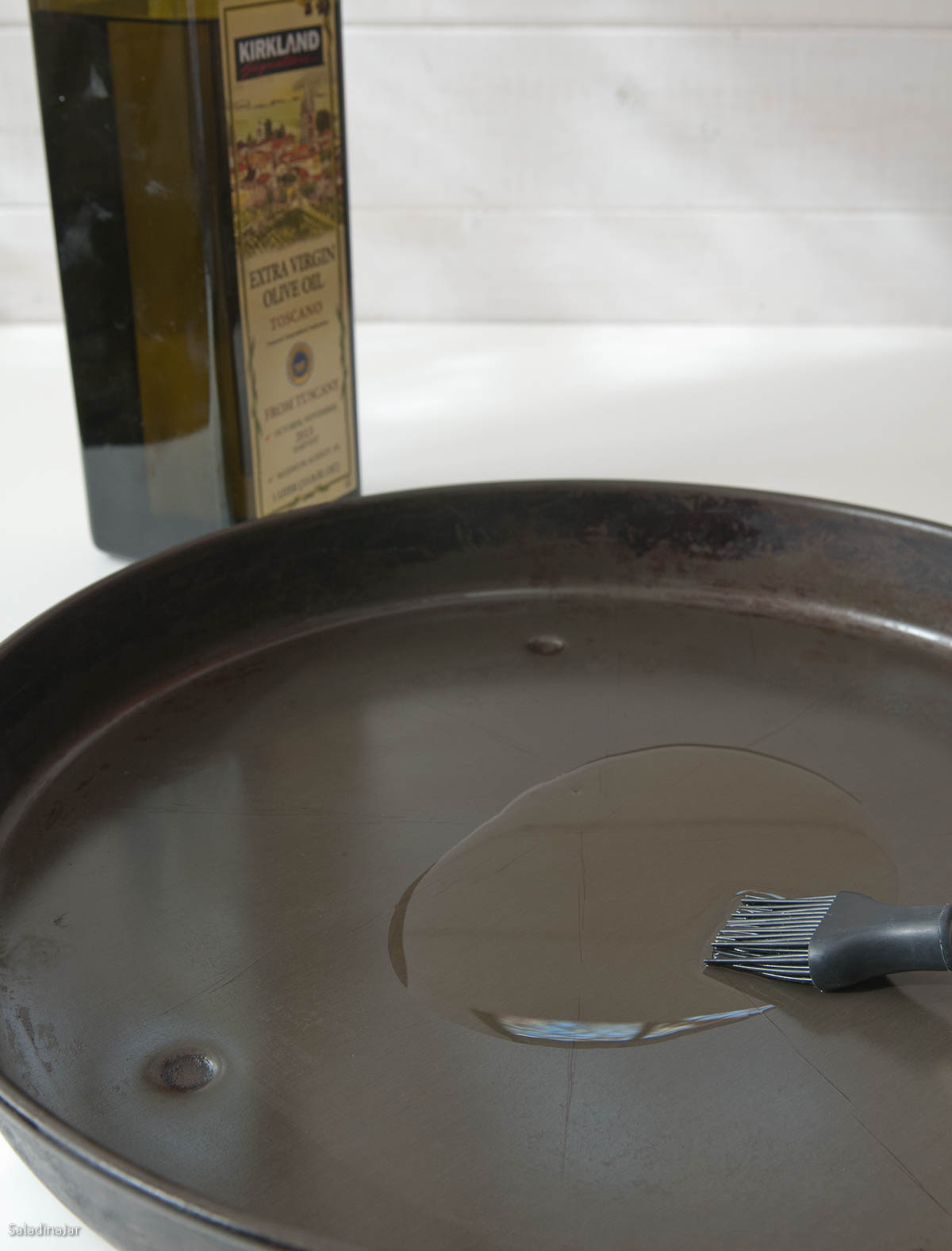 greasing your pan with olive oil.