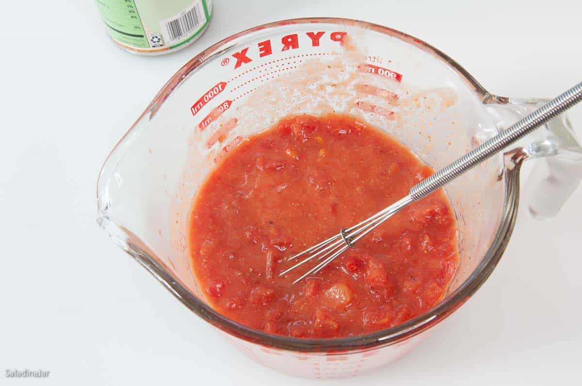 Before cooking the gravy--whisk in tomatoes