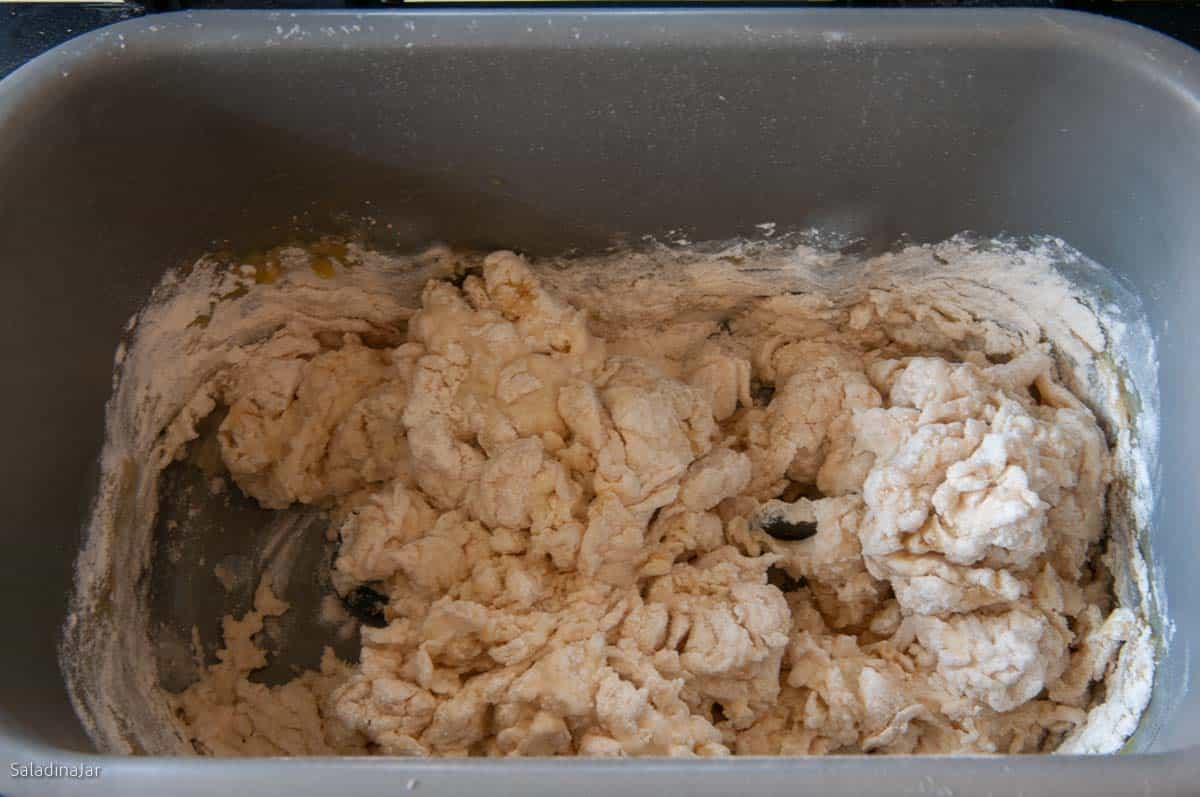 The dough should look clumpy within the first minute of mixing.