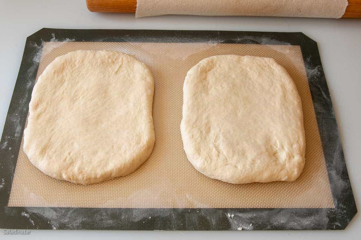 the dough is divided in half and shaped into small rectangles.