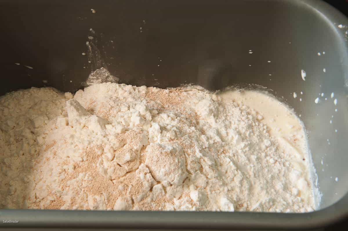 all ingredients added to the bread maker pan in the order listed in the recipe.