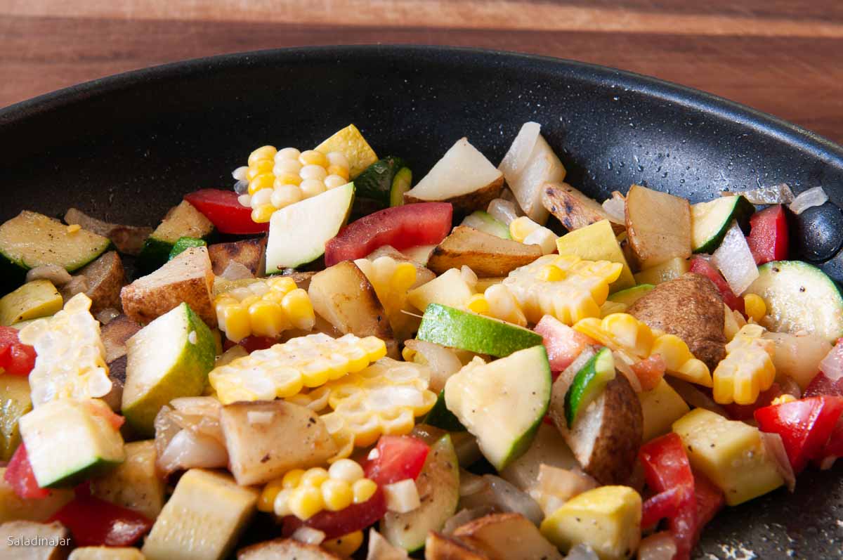 cooking veggie mixture. in a skillet.