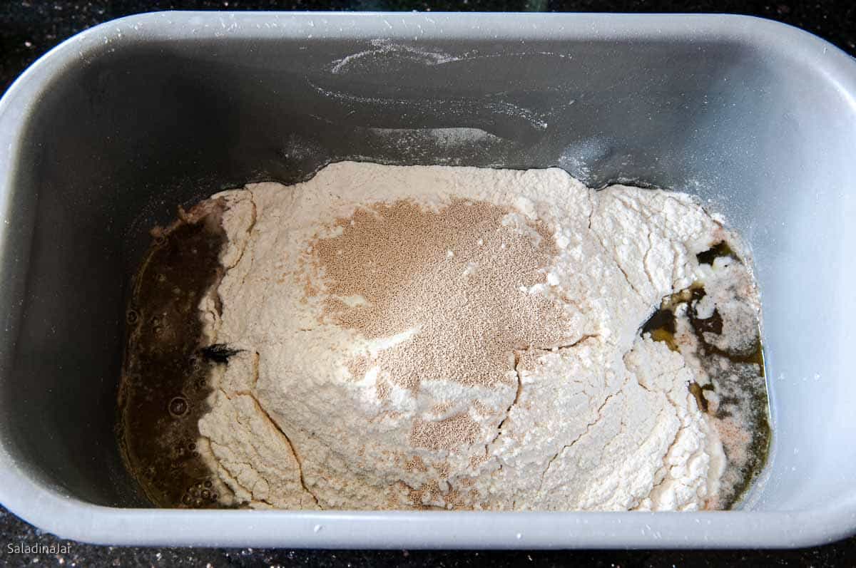 all ingredients for dough in the bread machine.