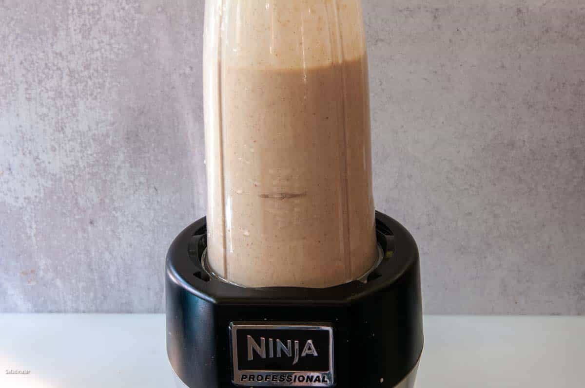 Blending all the ingredients in a Ninja blender.