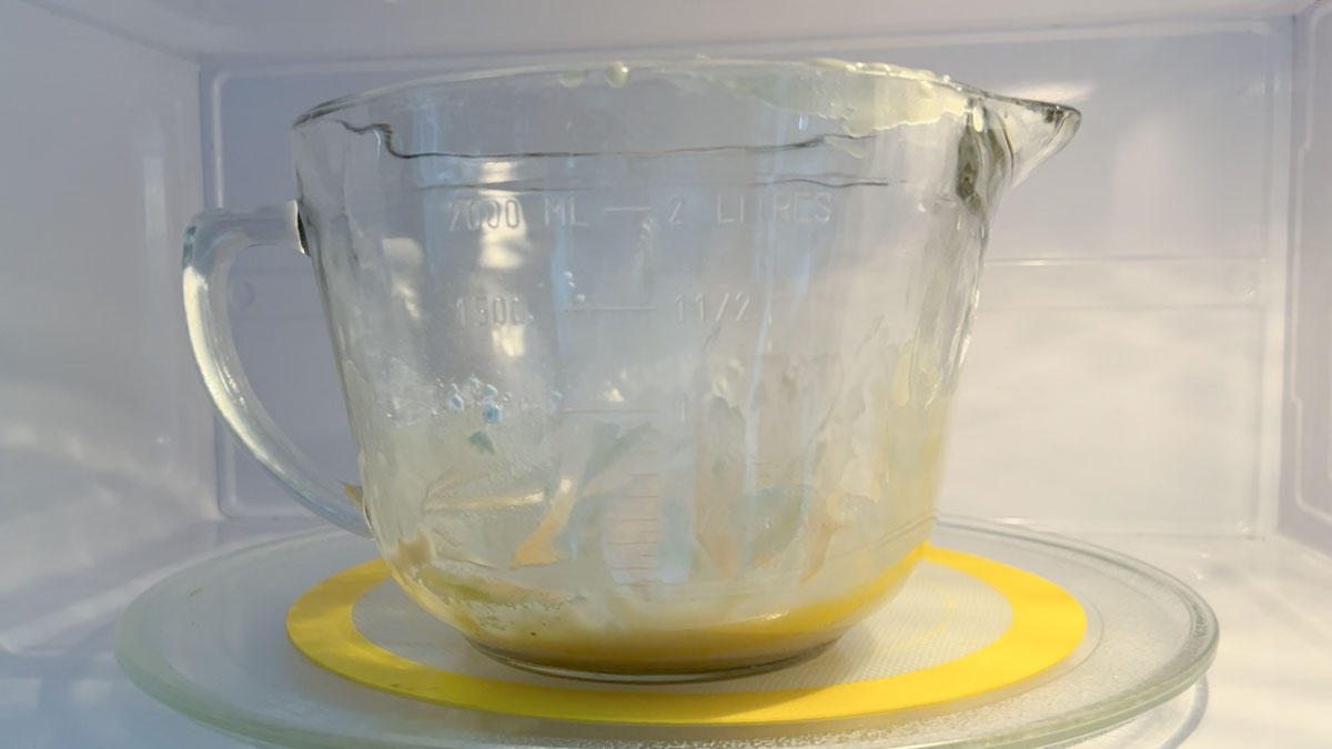 Placing the flour and oil into a microwave oil.