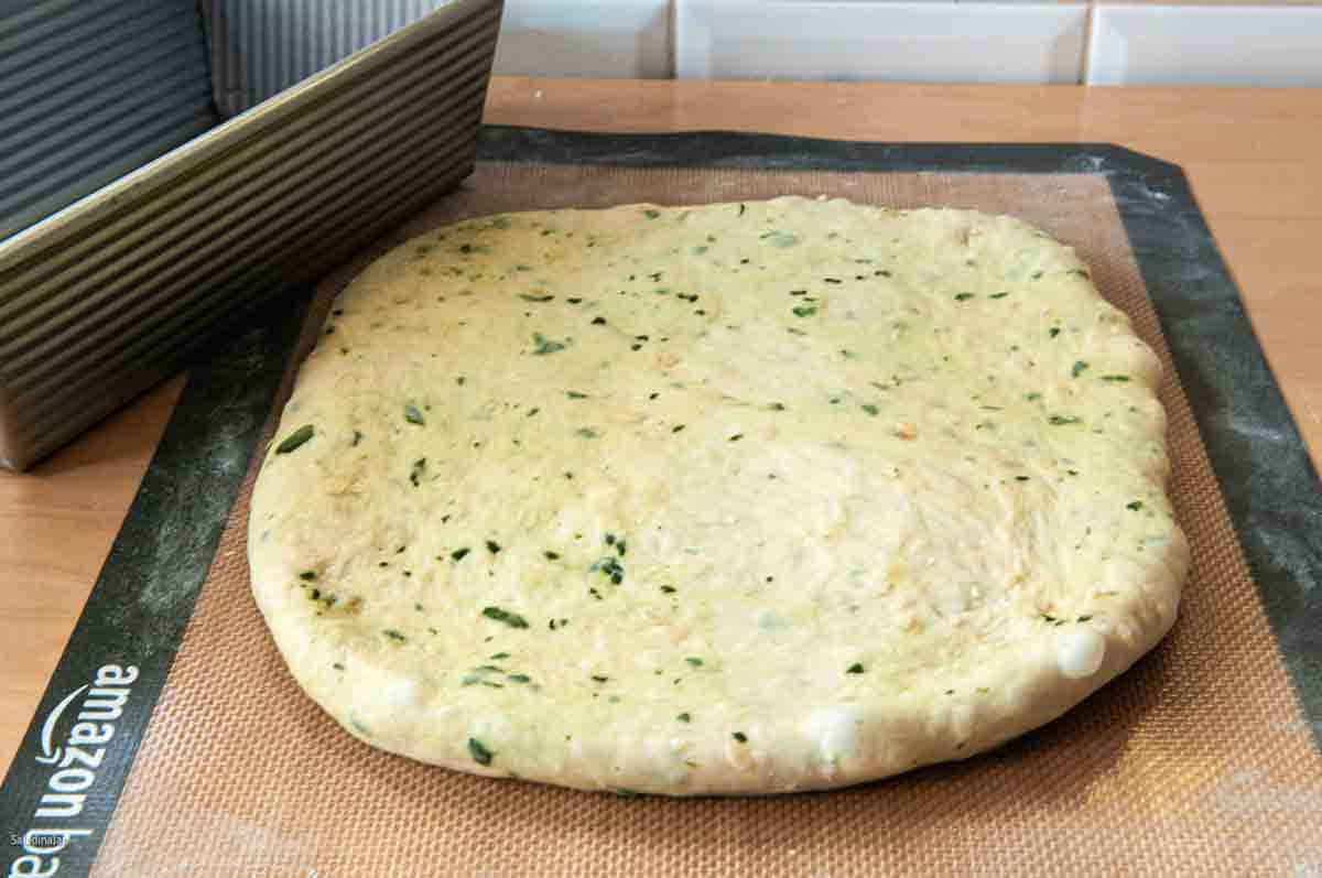 Dough has been rolled or pressed into a rectangle