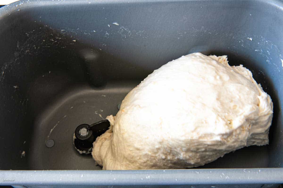 Toward the end of the kneading phase, the dough should be smooth, elastic as shown.