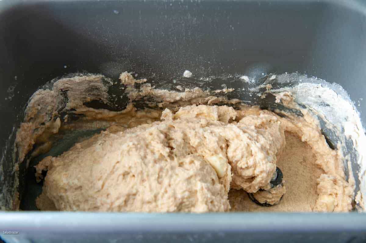 Dough is clumping during the first minute of mixing.