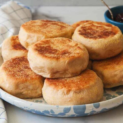 Bread Machine English Muffins piled on a serving plate.