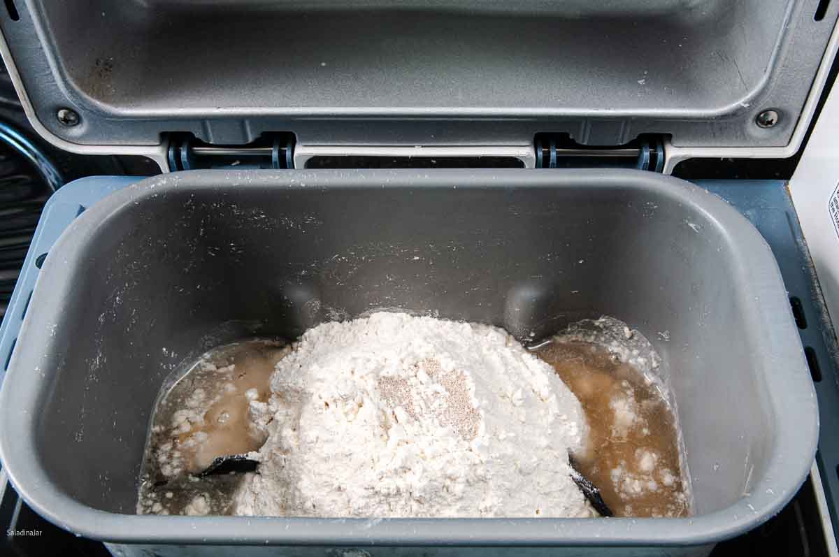 all ingredients in the bread machine pan.