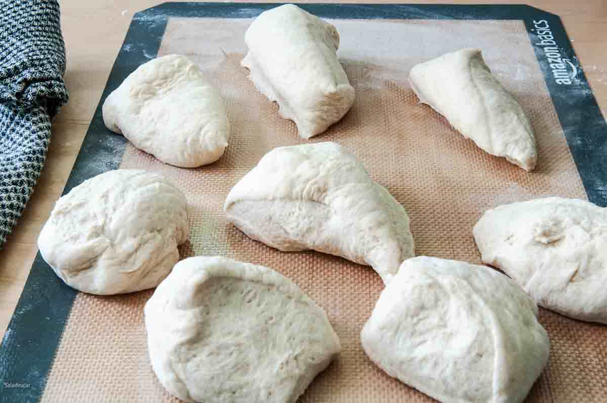 Dividing the dough into 8 equal portions.
