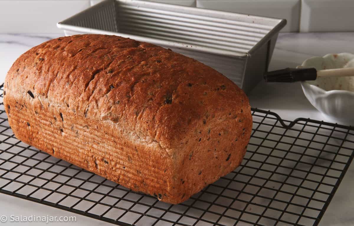 Baked bread on a cooling rack.