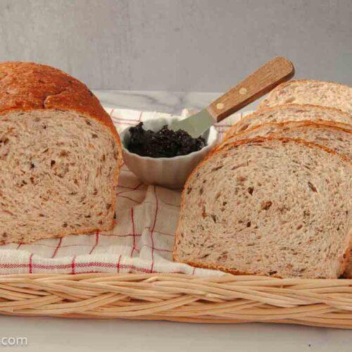 baked and sliced wild rice bread with fig butter on the side.