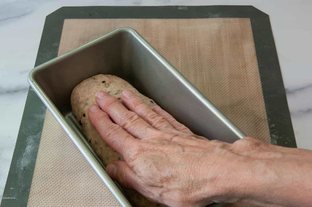 Flatten the dough inside the pan.