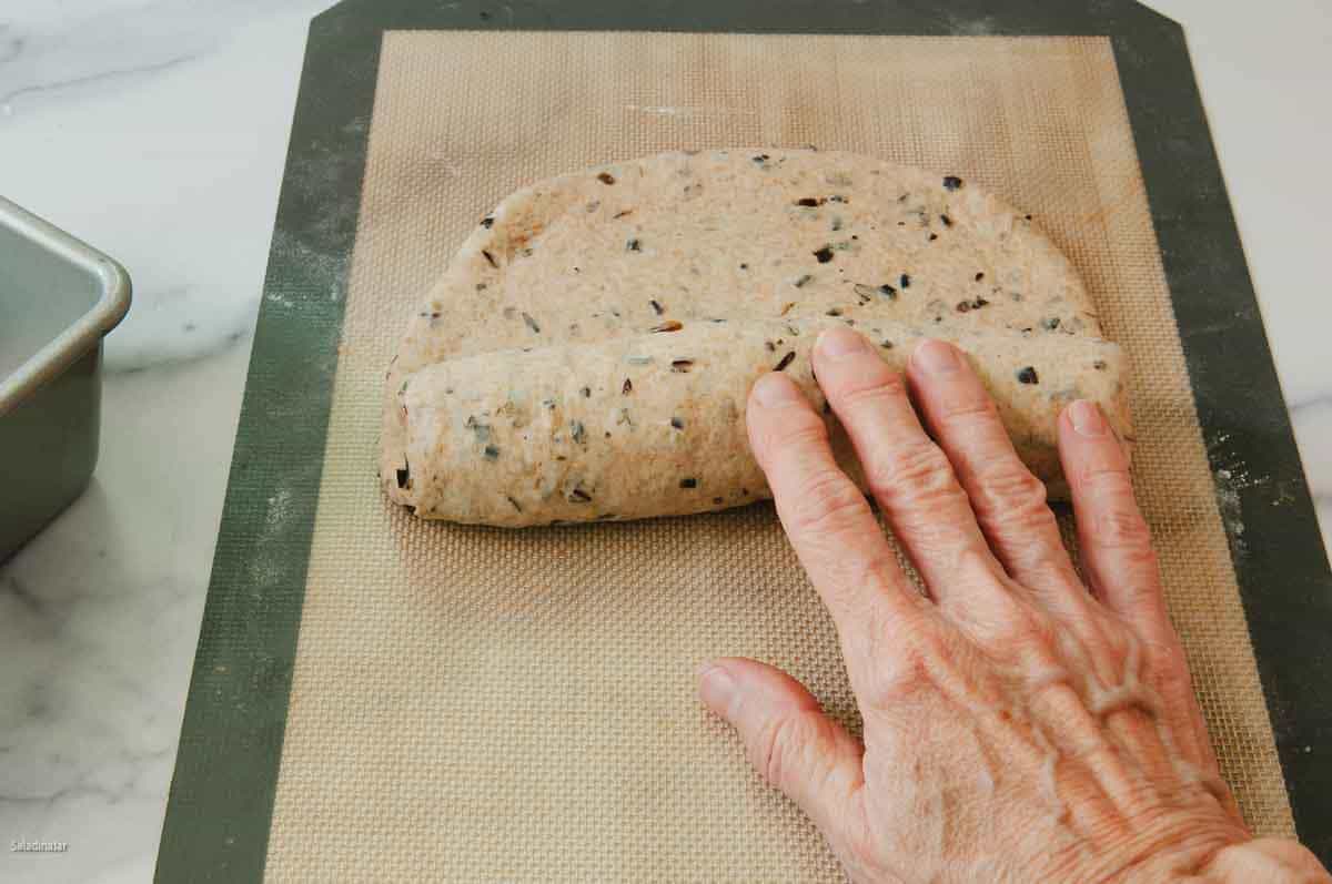 Making a cylinder out of the dough.