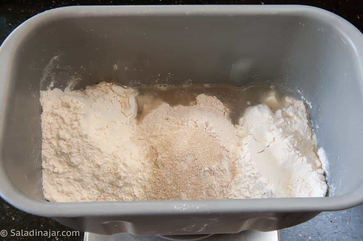 All ingredients are added to the bread machine pan.