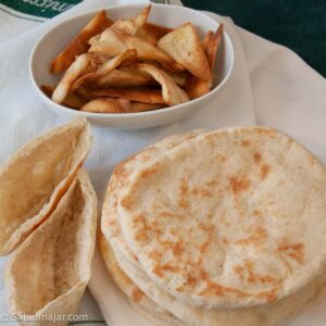 Bread Machine Pita Bread recipe showing baked pita, pita pockets and pita chips.